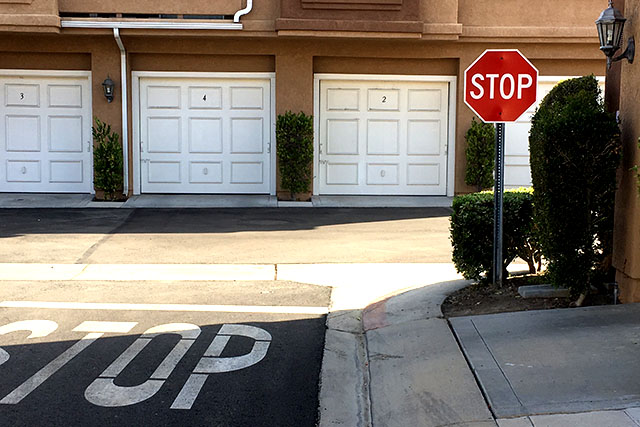 Entrance street stop sign within the Lake Forest Shores compounds