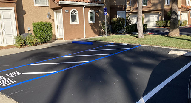 Handicap parking marked at the entrance of the gates.