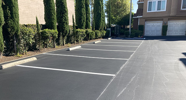 Newly seals parking area with striping.